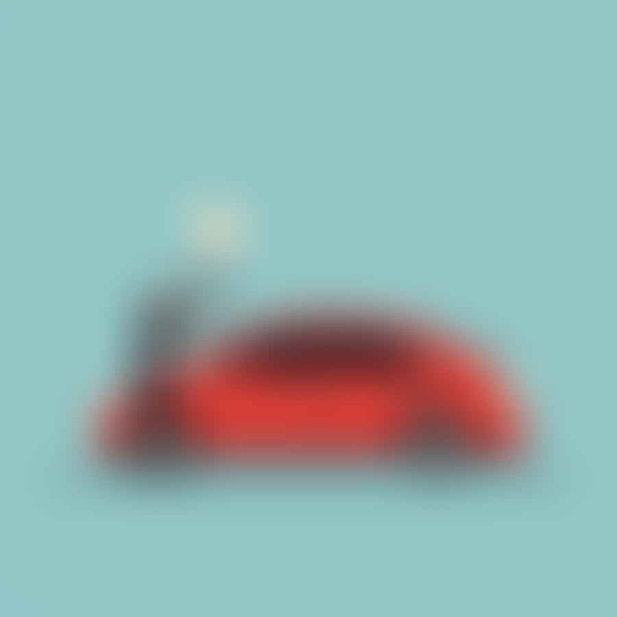 A person pulling a plunger off a car, dent popping out
