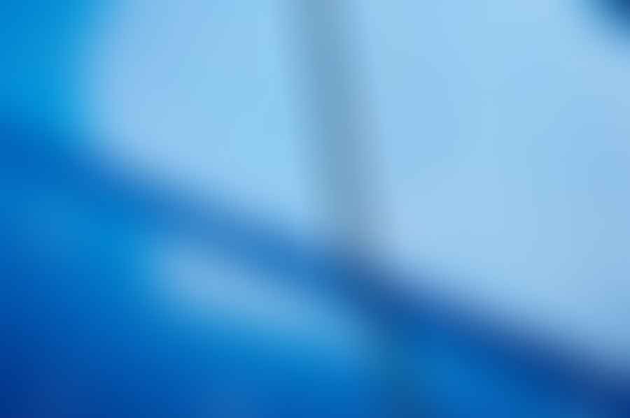 Close-up view of glossy car paint reflecting light